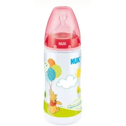 Nuk Biberon First Choice Winnie L'Ourson - Disney 2ème âge 300 ml.