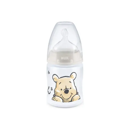 Nuk First Choice + Biberon Winnie l'Ourson 0-6 mois 150ml Nuk First Choice + Biberon Winnie l'Ourson 0-6 mois 150ml