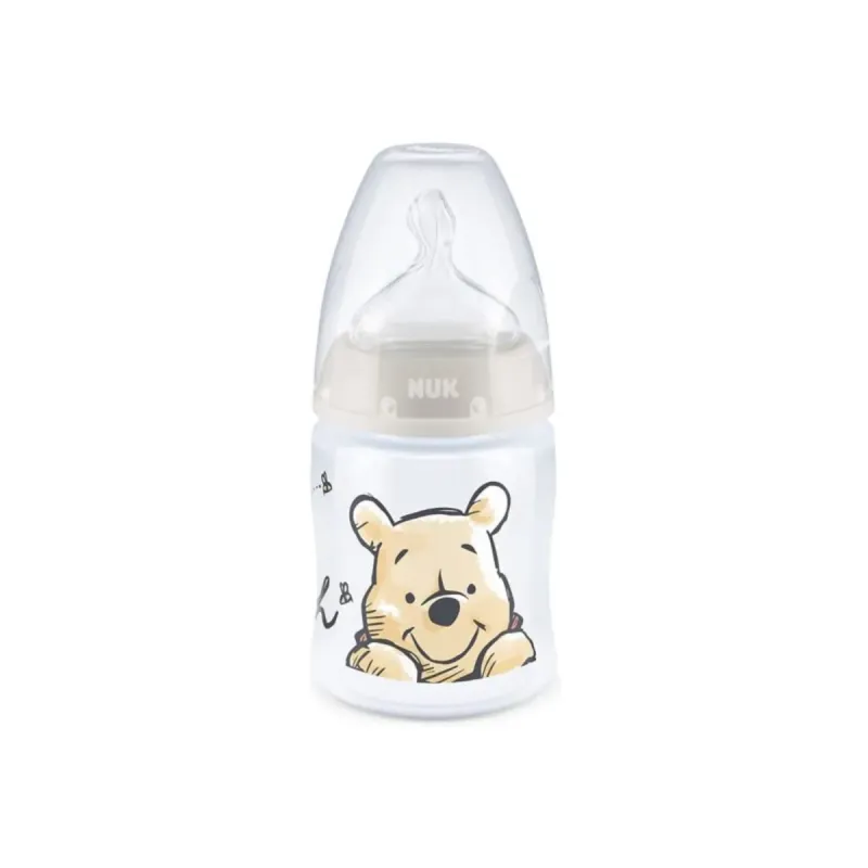 Nuk First Choice + Biberon Winnie l'Ourson 0-6 mois 150ml Nuk First Choice + Biberon Winnie l'Ourson 0-6 mois 150ml